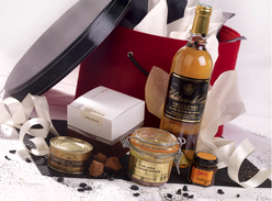 Une jolie boite à chapeau qui renferme de délicieux produits pour fins gourmets